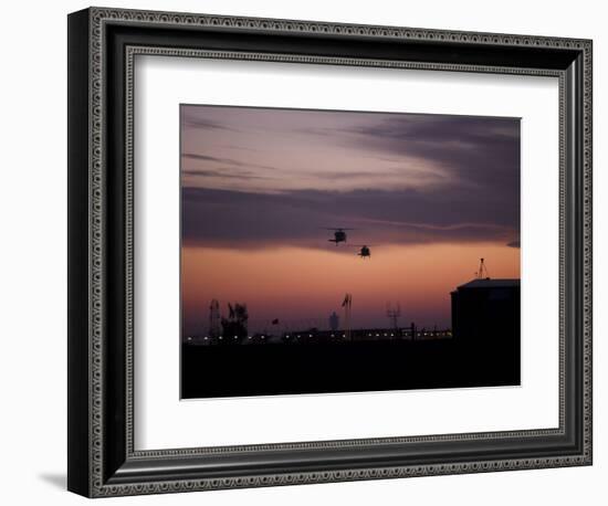 A Pair of UH-60 Black Hawk Helicopters Approach their Landing in Baghdad, Iraq-null-Framed Photographic Print