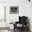 A Pakistani Barber Gives a Haircut and Beard Trim to a Customer-null-Framed Photographic Print displayed on a wall