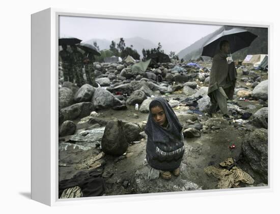 A Pakistani Earthquake Survivor Shivers-null-Framed Premier Image Canvas