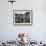 A Pakistani Earthquake Survivor Shivers-null-Framed Photographic Print displayed on a wall