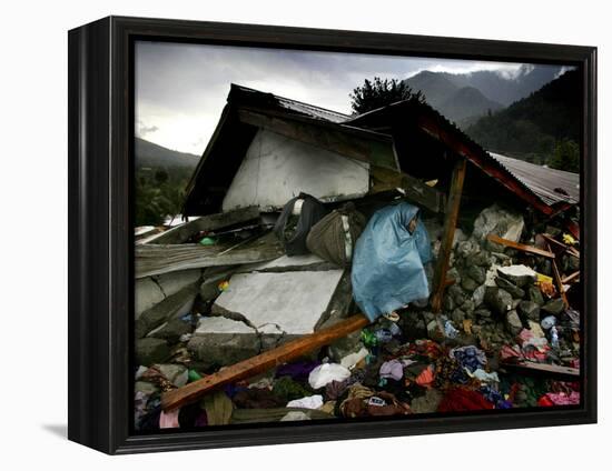 A Pakistani Earthquake Survivor Takes Shelter from the Rain-null-Framed Premier Image Canvas