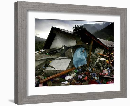 A Pakistani Earthquake Survivor Takes Shelter from the Rain-null-Framed Photographic Print