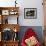 A Pakistani Earthquake Survivor Takes Shelter from the Rain-null-Framed Photographic Print displayed on a wall