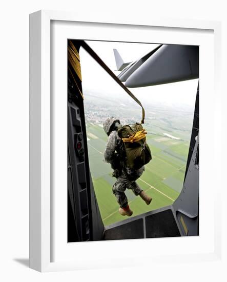 A Paratrooper Executes An Airborne Jump Out of a C-17 Globemaster III-Stocktrek Images-Framed Photographic Print