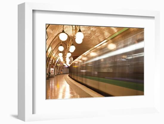 A Paris Metro Train Leaves Cite Station, Paris, France, Europe-Julian Elliott-Framed Photographic Print