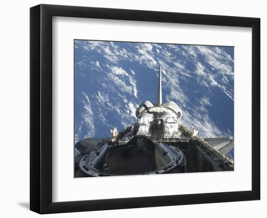 A Partial View of Space Shuttle Atlantis Backdropped by a Blue and White Earth-null-Framed Photographic Print