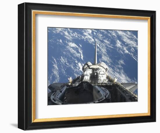 A Partial View of Space Shuttle Atlantis Backdropped by a Blue and White Earth-null-Framed Photographic Print