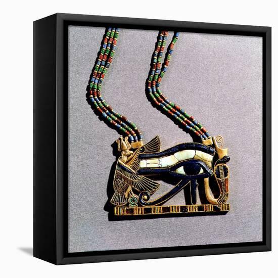 A pendant from the tomb of Tutankhamun in the form of a 'Wedjat eye'-Werner Forman-Framed Premier Image Canvas