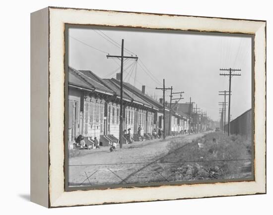 A person street in New Orleans, Louisiana, 1935-Walker Evans-Framed Premier Image Canvas