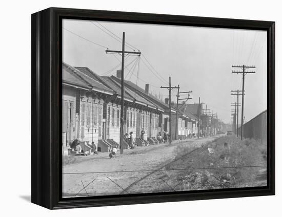 A person street in New Orleans, Louisiana, 1935-Walker Evans-Framed Premier Image Canvas