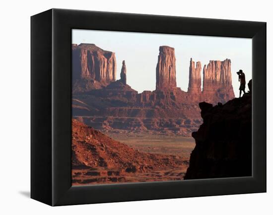 A Photographer at Monument Valley in the Navajo Nation, Ariz.-null-Framed Premier Image Canvas