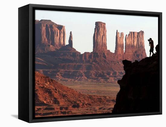 A Photographer at Monument Valley in the Navajo Nation, Ariz.-null-Framed Premier Image Canvas