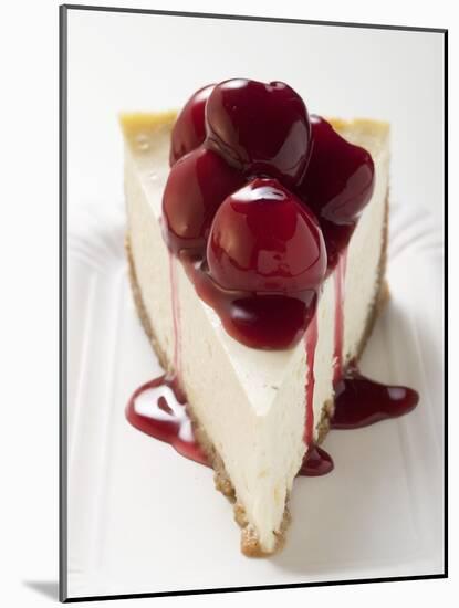 A Piece of Cheesecake with Cherry Sauce-null-Mounted Photographic Print