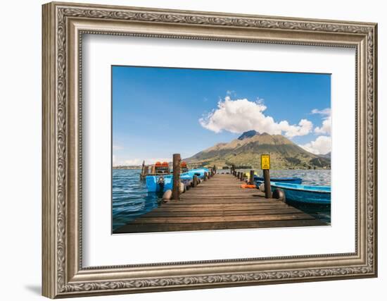 A pier and boat on Lago San Pablo, at the base of Volcan Imbabura, close to the famous market town-Alexandre Rotenberg-Framed Photographic Print