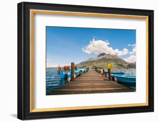 A pier and boat on Lago San Pablo, at the base of Volcan Imbabura, close to the famous market town-Alexandre Rotenberg-Framed Photographic Print