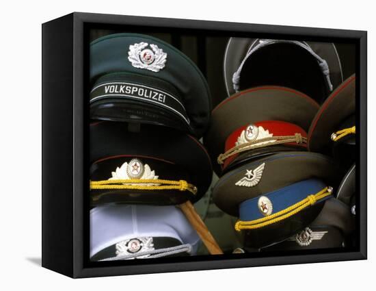 A Pile of Communist Era Army and Police Hats for Sale as Souvenirs, Mitte, Berlin, Germany-Richard Nebesky-Framed Premier Image Canvas