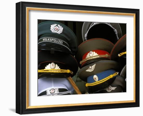 A Pile of Communist Era Army and Police Hats for Sale as Souvenirs, Mitte, Berlin, Germany-Richard Nebesky-Framed Photographic Print