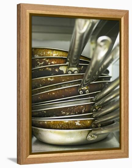 A Pile of Frying Pans in a Commercial Kitchen-Herbert Lehmann-Framed Premier Image Canvas