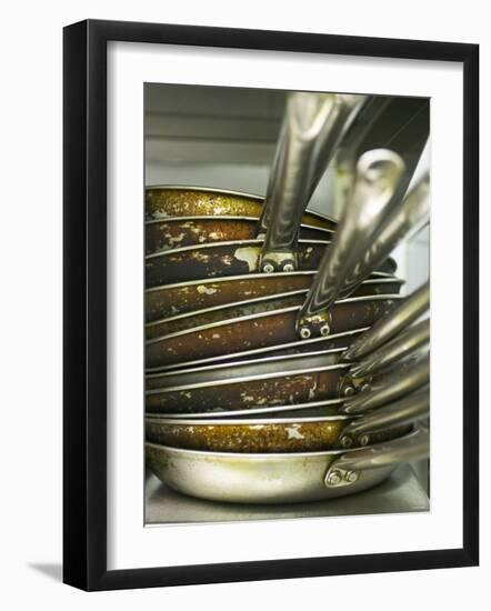 A Pile of Frying Pans in a Commercial Kitchen-Herbert Lehmann-Framed Photographic Print