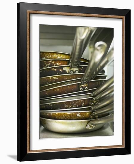 A Pile of Frying Pans in a Commercial Kitchen-Herbert Lehmann-Framed Photographic Print