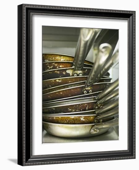 A Pile of Frying Pans in a Commercial Kitchen-Herbert Lehmann-Framed Photographic Print