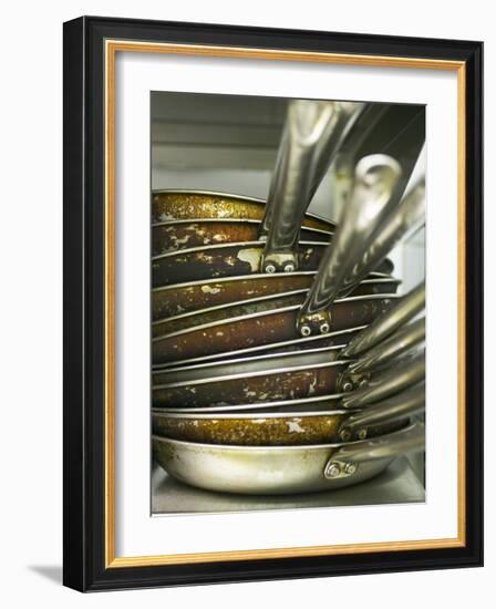 A Pile of Frying Pans in a Commercial Kitchen-Herbert Lehmann-Framed Photographic Print