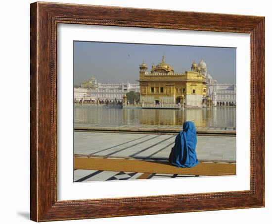 A Pilgrim in Blue Sits by the Holy Pool of Nectar at the Golden Temple, Punjab, India-Jeremy Bright-Framed Photographic Print