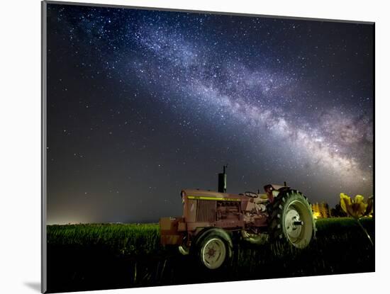 A Pink Tractor (With a Breast-Cancer Awareness Ribbon) Sits Beneath the Milky Way in a Tulip Field-Ben Coffman-Mounted Photographic Print