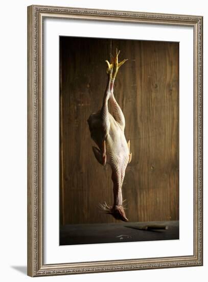 A Plucked Capon, Hung Up-Ulrike Schmid-Framed Photographic Print