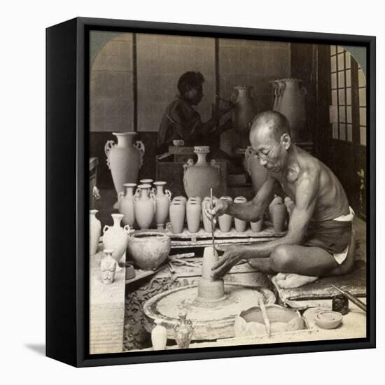 A Potter and His Wheel, Fashioning a Vase of Awata Porcelain, Kinkosan Works, Kyoto, Japan, 1904-Underwood & Underwood-Framed Premier Image Canvas