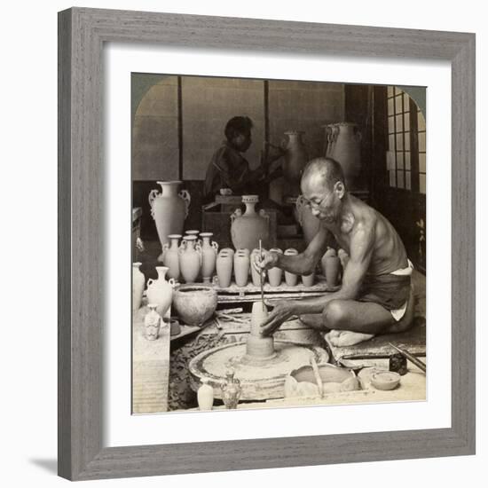 A Potter and His Wheel, Fashioning a Vase of Awata Porcelain, Kinkosan Works, Kyoto, Japan, 1904-Underwood & Underwood-Framed Photographic Print