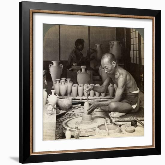 A Potter and His Wheel, Fashioning a Vase of Awata Porcelain, Kinkosan Works, Kyoto, Japan, 1904-Underwood & Underwood-Framed Photographic Print