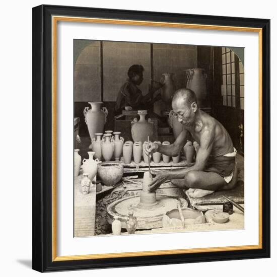 A Potter and His Wheel, Fashioning a Vase of Awata Porcelain, Kinkosan Works, Kyoto, Japan, 1904-Underwood & Underwood-Framed Photographic Print