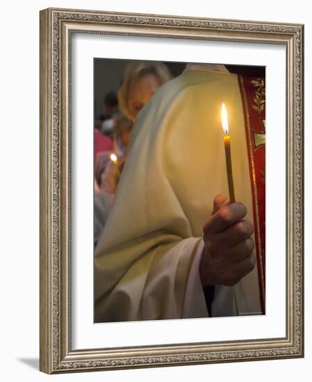 A Priest's Hand Holding a Candle During Mass in Easter Week, Old City, Israel-Eitan Simanor-Framed Photographic Print