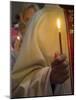 A Priest's Hand Holding a Candle During Mass in Easter Week, Old City, Israel-Eitan Simanor-Mounted Photographic Print