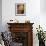 A Priest's Hand Holding a Candle During Mass in Easter Week, Old City, Israel-Eitan Simanor-Framed Photographic Print displayed on a wall