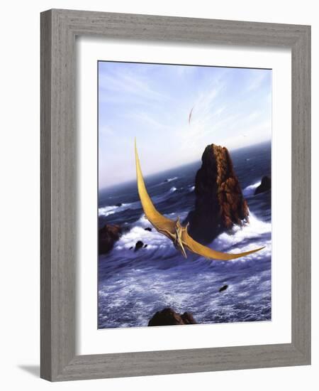 A Pteranodon Soars Above the Ocean and Rocks-null-Framed Art Print