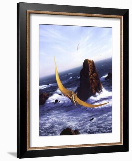 A Pteranodon Soars Above the Ocean and Rocks-null-Framed Art Print