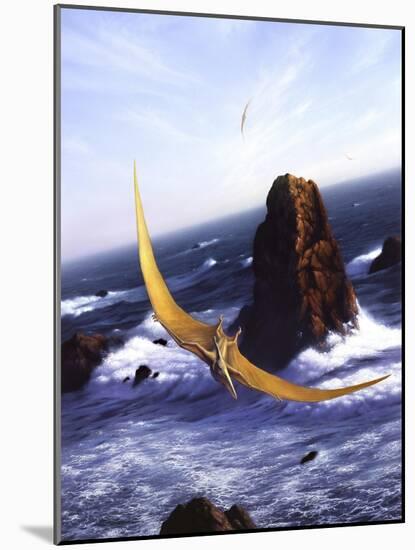 A Pteranodon Soars Above the Ocean and Rocks-null-Mounted Art Print
