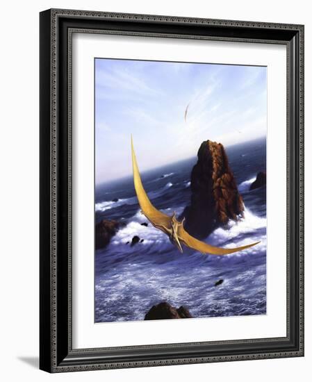 A Pteranodon Soars Above the Ocean and Rocks-null-Framed Art Print