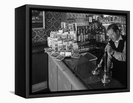 A Pub Landlord with a Display of the Batchelors 5 Day Catering Pack on His Bar, 1968-Michael Walters-Framed Premier Image Canvas