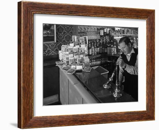 A Pub Landlord with a Display of the Batchelors 5 Day Catering Pack on His Bar, 1968-Michael Walters-Framed Photographic Print