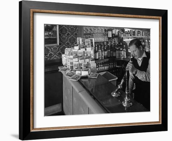 A Pub Landlord with a Display of the Batchelors 5 Day Catering Pack on His Bar, 1968-Michael Walters-Framed Photographic Print