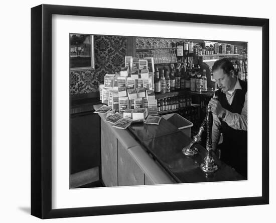 A Pub Landlord with a Display of the Batchelors 5 Day Catering Pack on His Bar, 1968-Michael Walters-Framed Photographic Print