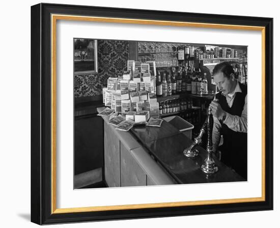 A Pub Landlord with a Display of the Batchelors 5 Day Catering Pack on His Bar, 1968-Michael Walters-Framed Photographic Print