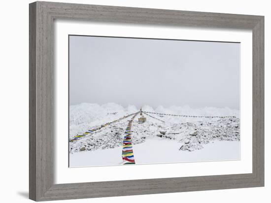 A puja adorned with prayer flags on Khumbu glacier, Everest Base Camp, Khumbu, Nepal, Himalayas-Alex Treadway-Framed Photographic Print