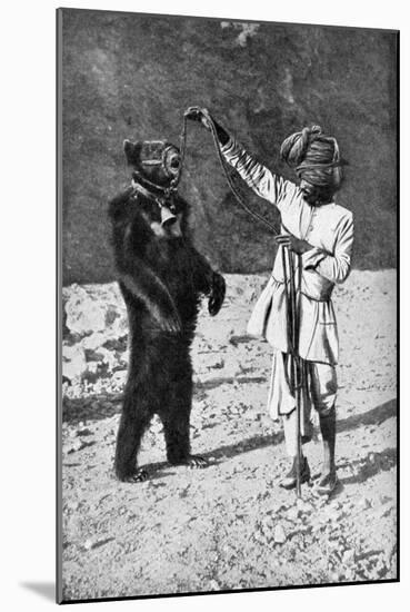 A Punjabi Native with a Dancing Bear, India, 1922-Robert Chisham-Mounted Giclee Print