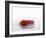 A Red Chilli Pepper Falling into Water-Kröger & Gross-Framed Photographic Print