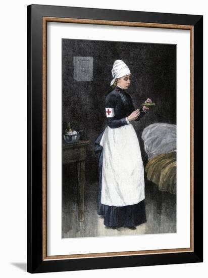 A Red Cross Hospital nurse Pouring Medicine, Late 1800s-null-Framed Giclee Print