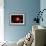 A Red Giant Star System-null-Framed Art Print displayed on a wall